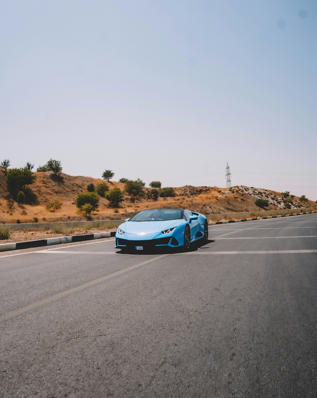 luxury sports car on open road