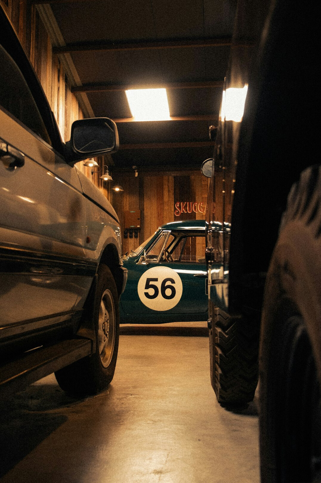 Old brick garage in Montevideo housing a restored vintage automobile